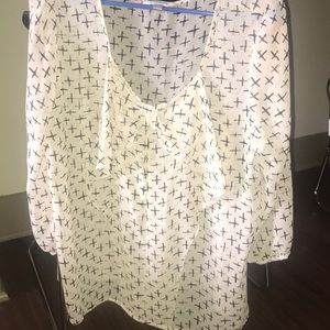 Sheer tan top with bow and cross-details